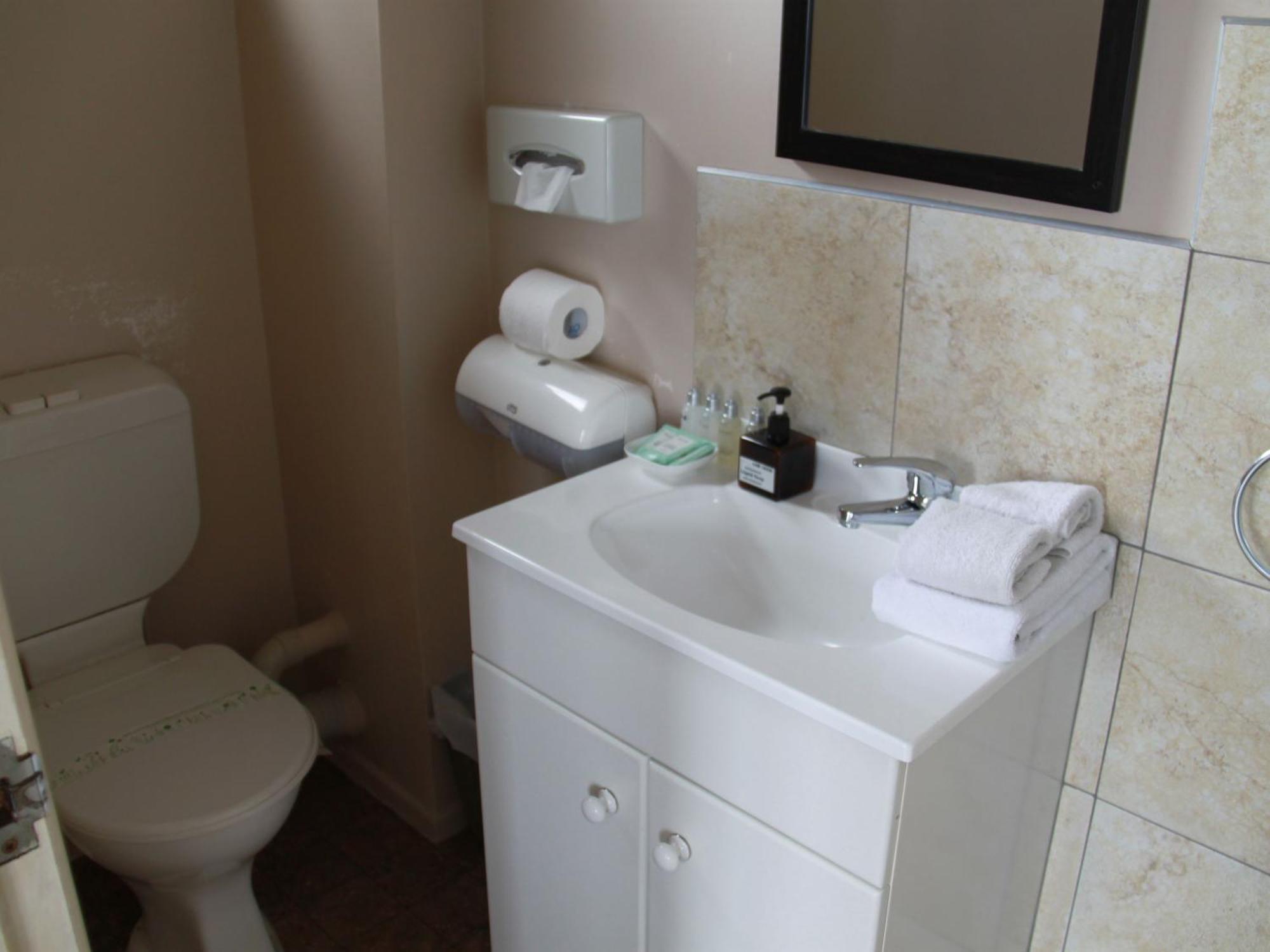 Asure Camelot Arms Motor Lodge Auckland Phòng bức ảnh