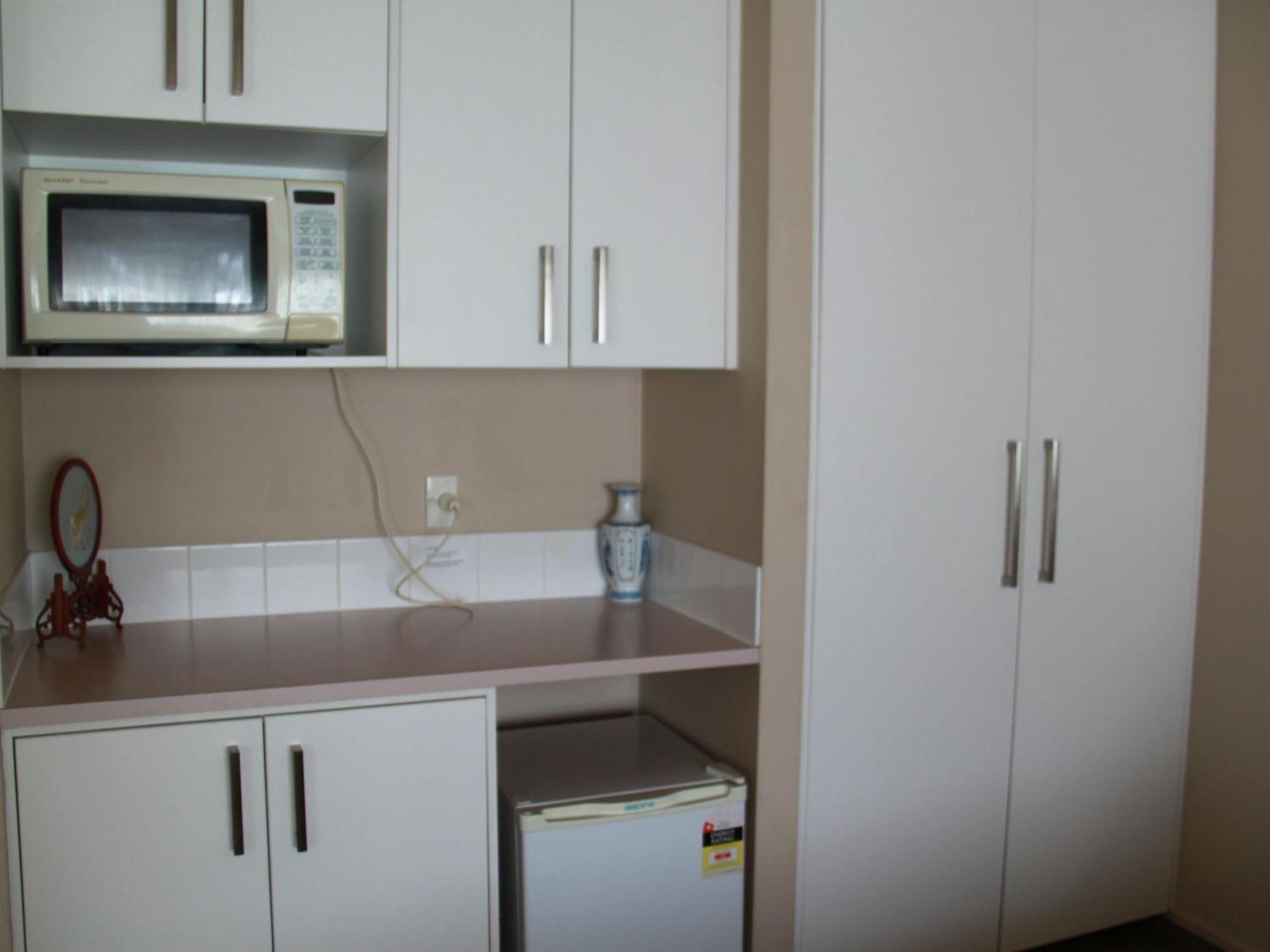 Asure Camelot Arms Motor Lodge Auckland Phòng bức ảnh