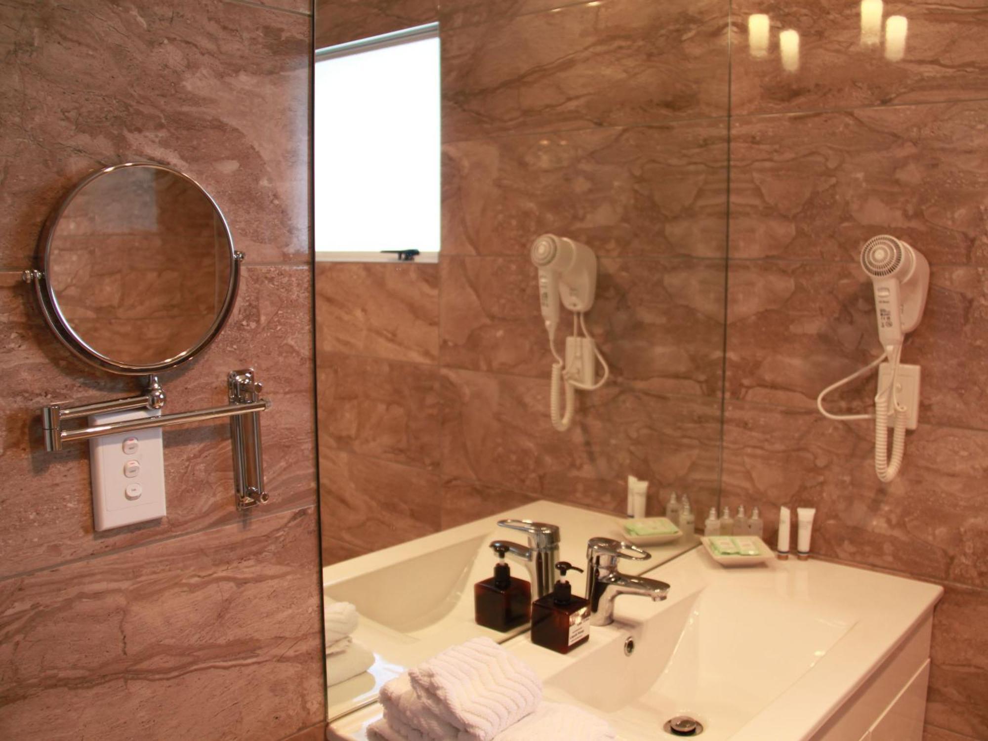 Asure Camelot Arms Motor Lodge Auckland Phòng bức ảnh