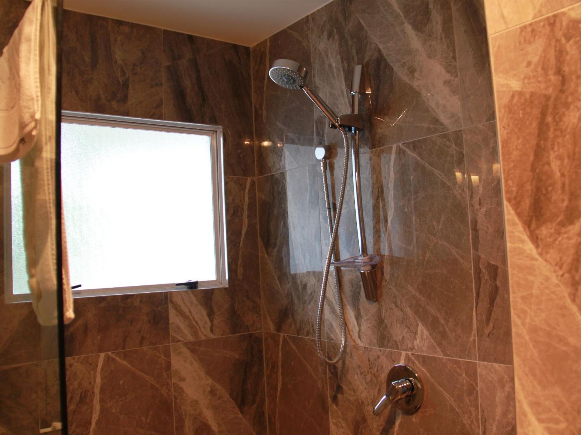 Asure Camelot Arms Motor Lodge Auckland Phòng bức ảnh