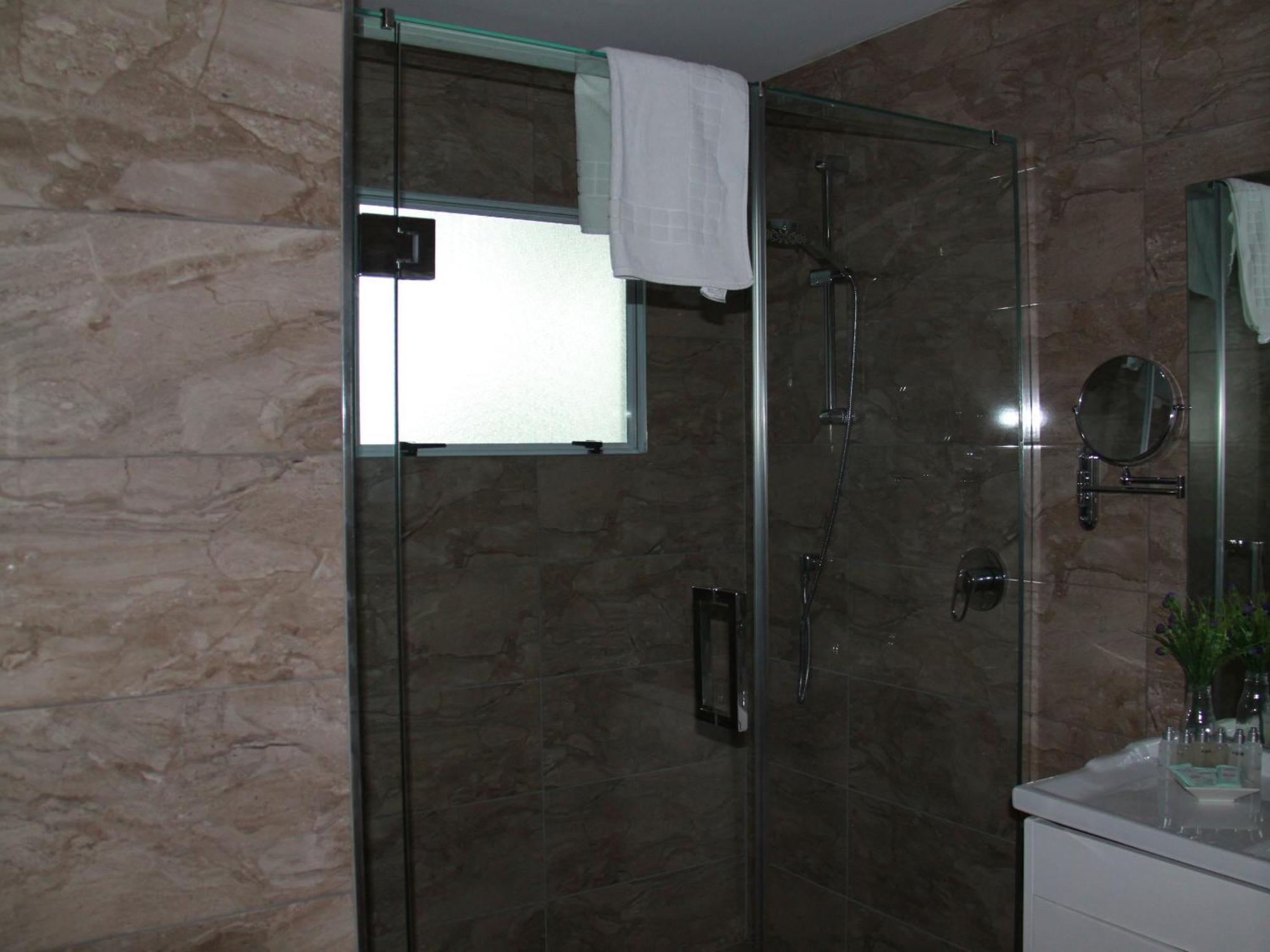 Asure Camelot Arms Motor Lodge Auckland Phòng bức ảnh